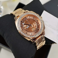 Montre pour femme en strass, boîtier coussin or rose, lunette en cristal, cadran floral, chic, élégante, stylée, à quartz, cadeau, résistante à l'eau
