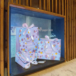 Vente chaude Sacs en papier cadeau blancs de luxe avec logo personnalisé imprimé Accessoires de ruban de luxe avec estampage à chaud doré Impression de lamination - Product Image 2