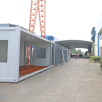Mini magasin préfabriqué personnalisé de 20 pieds à faible coût Tôle ondulée modulaire portable préfabrication de maison en conteneur plat avec auvent