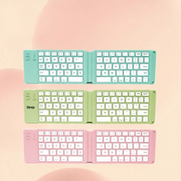 Nouveau mini clavier portable sans fil Bluetooth pliable en deux, léger, universel pour téléphone portable et tablette, cadeau