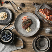 Salle à manger vintage réactive émaillée mate brillante pierre fruits dessert luxe en céramique gris japonais assiettes plates ensembles pour restaurant