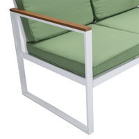 Chaise de jardin moderne en rotin vert avec coussin et pieds en métal blanc pour cour