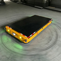 Chariot de transfert AGV robuste de 10 tonnes, véhicule à guidage automatique sans rail, chariot électrique plat pour la logistique industrielle en entrepôt