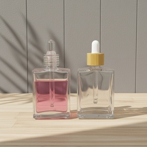 ขวดน้ำมันหอมระเหยราคาโรงงาน สีตามสั่ง พิมพ์โลโก้ด้วยผ้าไหม 30 มล. 50 มล. 100 มล. ขวดทรงสี่เหลี่ยมฝ้าพร้อมฝาหยด - Product Image 1