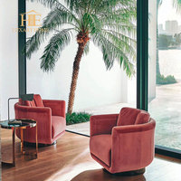 Canapé individuel rotatif de luxe personnalisé avec base noire pour hôtel, salon ou espace de détente