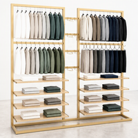 Étagère de présentation de vêtements en métal noir double face à deux niveaux avec étagères en bois et base en U – Vente en gros