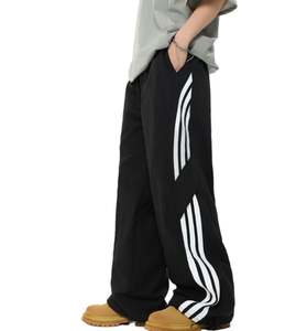 กางเกงวอร์มขายาวทรงตรงสไตล์สปอร์ตสำหรับผู้ชาย ดีไซน์ลายทาง เอวยางยืด ผ้าไนลอน แห้งเร็ว - Product Image 3