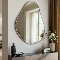 Table console noire personnalisée asymétrique avec cadre doré grand miroir mural simple et élégant pour la maison miroir d'inspiration art déco