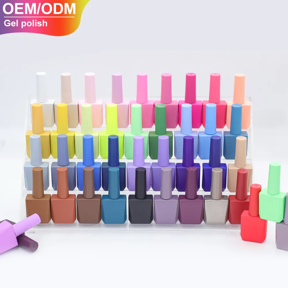 Colore personalizzato Design unico 10ml 15ml vuoto smalto Gel Uv bottiglia di vetro quadrato bottiglia di smalto per unghie con pennello bottiglie d'oro