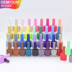 Color personalizado diseño único 10ml 15ml uñas vacías Uv Gel polaco botella de vidrio botella cuadrada de esmalte de uñas con cepillo botellas doradas