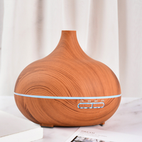 Le plus récent diffuseur d'arôme électrique de 500ml avec humidificateur d'air d'huile essentielle en bois télécommandé de 7 couleurs LED