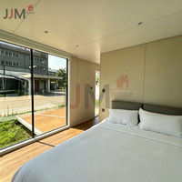 JJM Maison Conteneur Préfabriquée de Luxe P7 à 2 Chambres, Villa Capsule Spatiale Extérieure avec Panneau Solaire pour Supermarché et Appartement