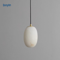 Lustre ovale minimaliste postmoderne en albâtre, lampe suspendue artistique sphérique multi-lumières pour escalier, villa, salon