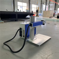 Machine de gravure laser à fibre CNC pour anneaux intérieurs/extérieurs et bagues d'oiseaux, refroidie par air, prenant en charge les formats DXF/PLT/AI/DWG/DST