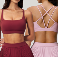 Soutien-gorge de yoga à bretelles croisées et dos élégant avec coussinets amovibles, ultra-doux et respectueux de la peau, haut de fitness très élastique pour femme