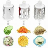 En stock Râpe à fromage rotative 3 en 1 Boîte à tambour rotative multifonctionnelle Coupe-fruits et légumes avec poignée