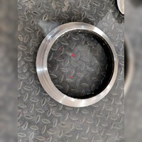 Pièces de rechange pour pompe à béton : Bague de découpe circulaire usinée en acier Q235B et carbure de tungstène pour équipement de construction