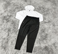 Ensemble deux pièces de survêtement de football vintage coupe-vent et à séchage rapide en nylon 100% pour l'entraînement – Nouveauté disponible en gros