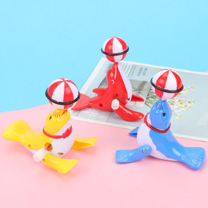 Jouet à remonter en forme de dauphin et de lion de mer, boule d'équilibre, mouvement par inertie, taille unique, plastique, unisexe, de 2 à 4 ans - Product Image 1