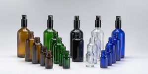 Botellas de Perfume Redondas de Vidrio Ámbar Oscuro de 30 ml, 50 ml y 100 ml con Pulverizador y Serigrafía - Product Image 4