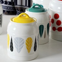 Conteneur de cuisine avec logo personnalisé Pot de stockage Pot de miel en céramique blanche Motif personnalisé pour la décoration intérieure