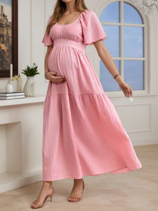 En stock <span class=keywords><strong>Robe</strong></span> <span class=keywords><strong>longue</strong></span> de maternité d'été unie à col en U, manches courtes volantées, dos smocké, taille à nouer et coupe évasée à volants - Product Image 2