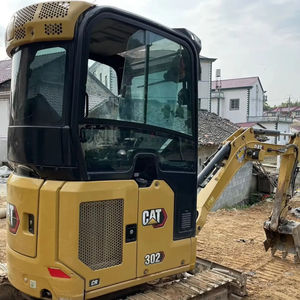 Mini-excavatrice CAT302 d'occasion entièrement contrôlée, fonctionnement flexible pour la reconstruction de jardins et les travaux de terrassement en espaces étroits - Product Image 1