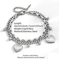 Bracelet en acier titane double couche en forme de cœur, plaqué or, avec chaîne entrelacée, design audacieux et unique