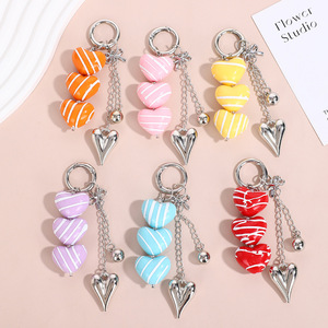 Nouveau porte-clés tendance avec pendentif cœur et nœud couleur bonbon, ornement élégant pour sac ou téléphone, cadeau mignon pour filles - Product Image 1