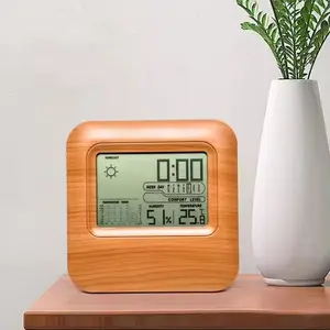 Estación meteorológica duradera en uso, pantalla LCD con indicador de temperatura y reloj despertador digital de humedad