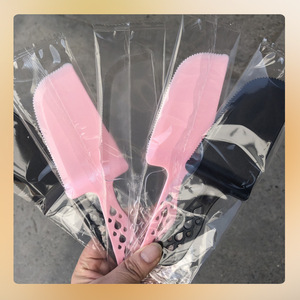 Disposable Cake Knife Serrated Plastic Cutter Pink Individually Packaged For Party Use - Product Image 1