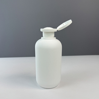 Bouteille blanche écologique Hengjian de 300 ml (10 oz) avec bouchon à clapet, idéale pour l'emballage de gel douche et de savon liquide