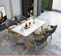 Table à manger moderne de luxe léger avec texture simple, idéale pour l'ameublement de la maison
