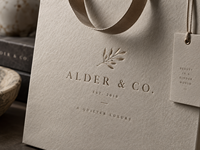 Sac en papier kraft recyclé de luxe avec logo embossé personnalisé et poignée en ruban pour l'emballage de la marque