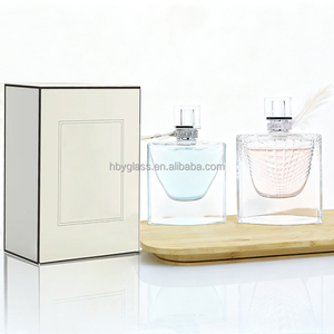 ขวดน้ำหอมแก้วทรงแบน คอจีบ ขนาด 100 มล. ลายเกล็ด<span class=keywords><strong>ปลา</strong></span> ใสแบบคริสตัล ฝาผ้าไหมแบบด้าน มีตัวเลือกขนาด 30 มล./50 มล. ขายส่ง - Product Image 1