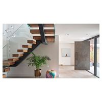 Escalier droit en bois flottant sur mesure avec garde-corps moderne en câble d'acier inoxydable