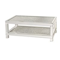 Table basse de style européen en acier inoxydable avec plateau en verre à surface perforée, luxe discret et design simple, pour salon
