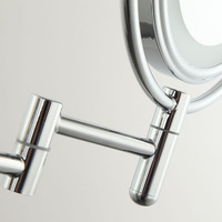 Miroir de courtoisie de maquillage grossissant rond et rotatif illuminé par LED moderne avec montage mural pivotant à 360 ° pour un usage domestique