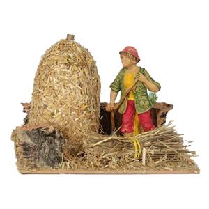 Pastor junto al montón de heno 15x15cm H 16cm - Product Image 1