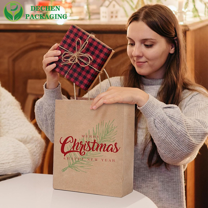 Bolsas de papel Kraft con logotipo de marca y asas hechas a medida
