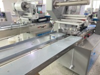 Máquina Automática de Envasado con Film Superior y Bandeja para Dumplings Congelados, Tangyuan, Wontons, Albóndigas, Mariscos y Otros Alimentos Congelados