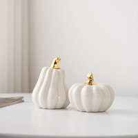 Ensemble de décorations d'intérieur en céramique en forme de citrouille, style luxueux discret, orange/blanc, avec des accents dorés brillants