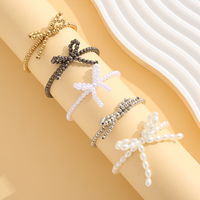 Ensemble de 5 bracelets perlés en fausses perles avec nœud papillon, or, argent, bronze, style bohème, extensibles, bijoux cadeau pour femmes