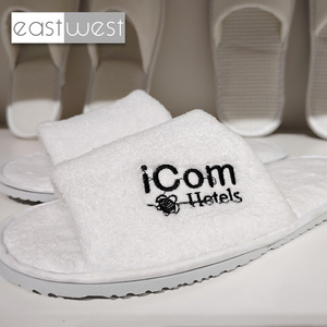 East West suministra al por mayor OEM Terry Coral Velvet <span class=keywords><strong>Hotel</strong></span> zapatillas suministro bajo MOQ barato desechable Spa zapatilla - Product Image 1
