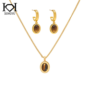 Collier pendentif en alliage de cuivre plaqué or 18 carats avec pierre œil de tigre style punk, luxe léger, tendance haut de gamme, polyvalent, cadeau superposé pour femme - Product Image 1
