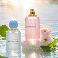 En stock flacons de parfum en verre ronds roses et bleus de luxe de 30 ml 50ml 100ml flacon de parfum clair vide personnalisé avec boîte d'emballage