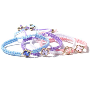 Bracciale classico a forma di quadrifoglio regolabile in corda di fiori con cristallo/strass con disegno a farfalla fortunata per regalo Unisex - Product Image 3
