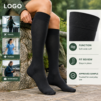 Chaussettes de compression pour mollets, à compression graduée 15-20 mmHg, noires, hauteur genou, avec manchette souple et large, pointe plate plus large, conformes à la tableau de mesure, vérifiées