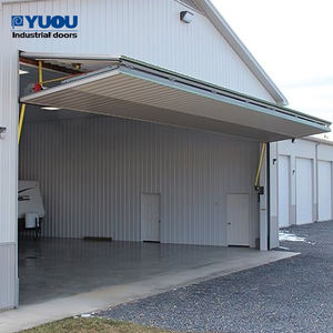 Panneau sandwich très vendu Portes de garage pliantes robustes et automatiques de haute qualité Portes de hangar en acier pliantes verticales - Product Image 1