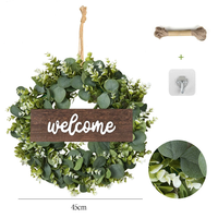 Vente en gros de couronnes de fleurs artificielles décoratives pour plantes, printemps et été, couronne verte d'eucalyptus pour porte d'entrée, décoration de Noël